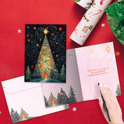 Christmas-themed cards and wrapping paper on a red background