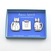 Cat magnet set in a blue box on white background.