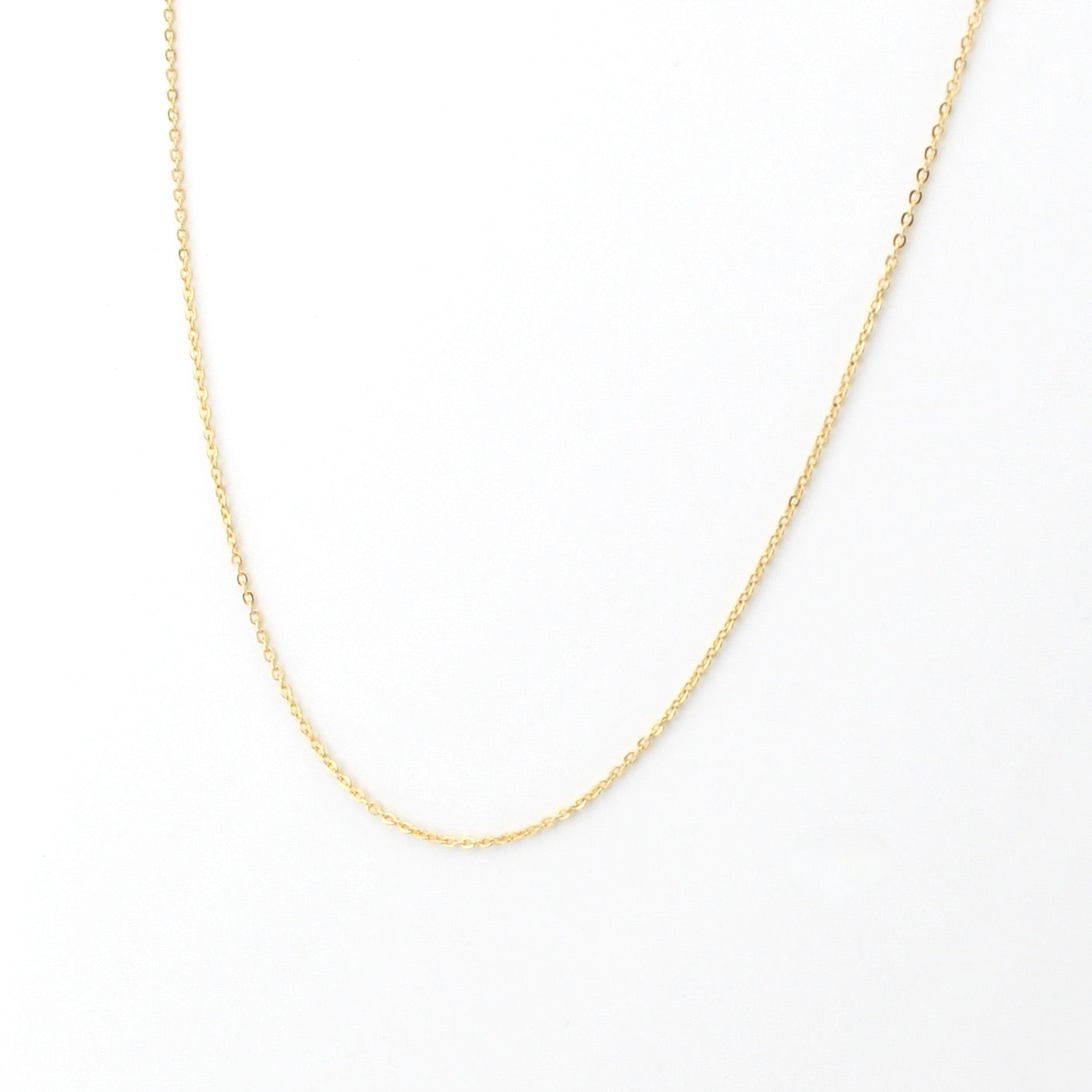 Gold chain on white background