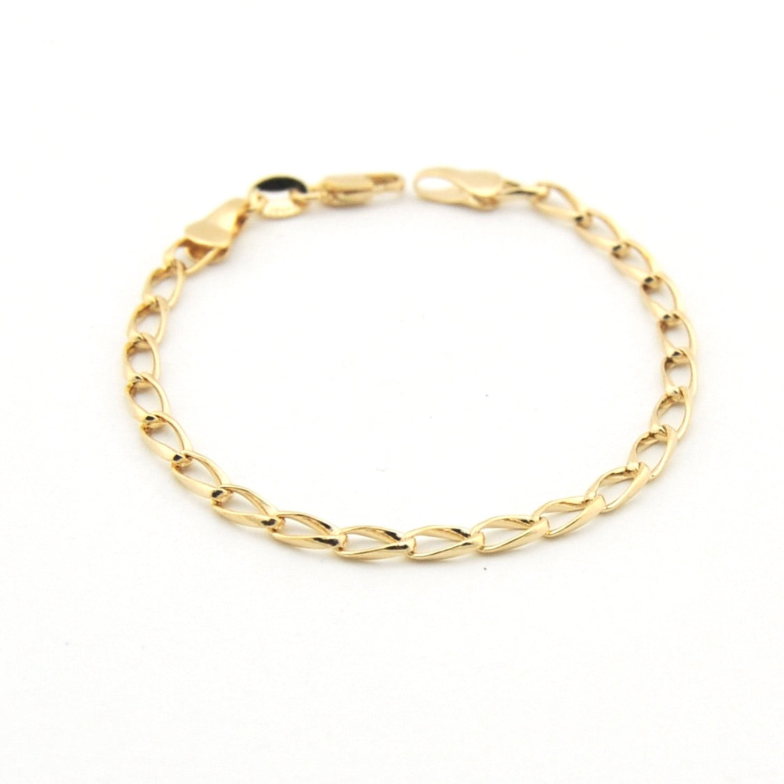 Gold chain bracelet on a white background