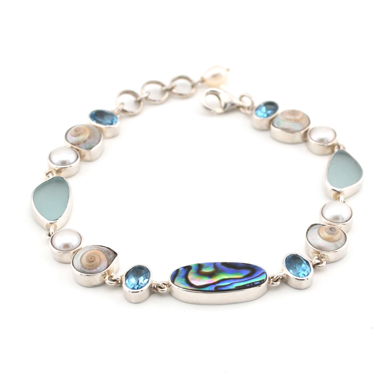 Silver bracelet with multicolored stones on a white background