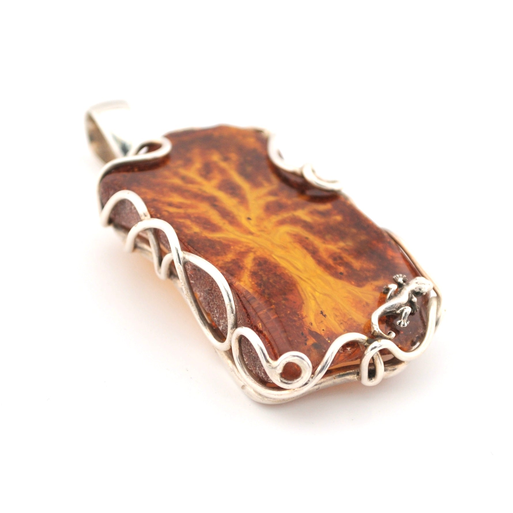 Brown stone pendant with silver wire wrapping on a white background