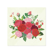 Floral arrangement with red, pink, and green flowers on a light background