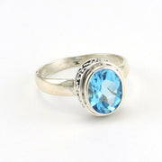 Side View Sterling Silver Blue Topaz 7x9mm Oval Bali Ring