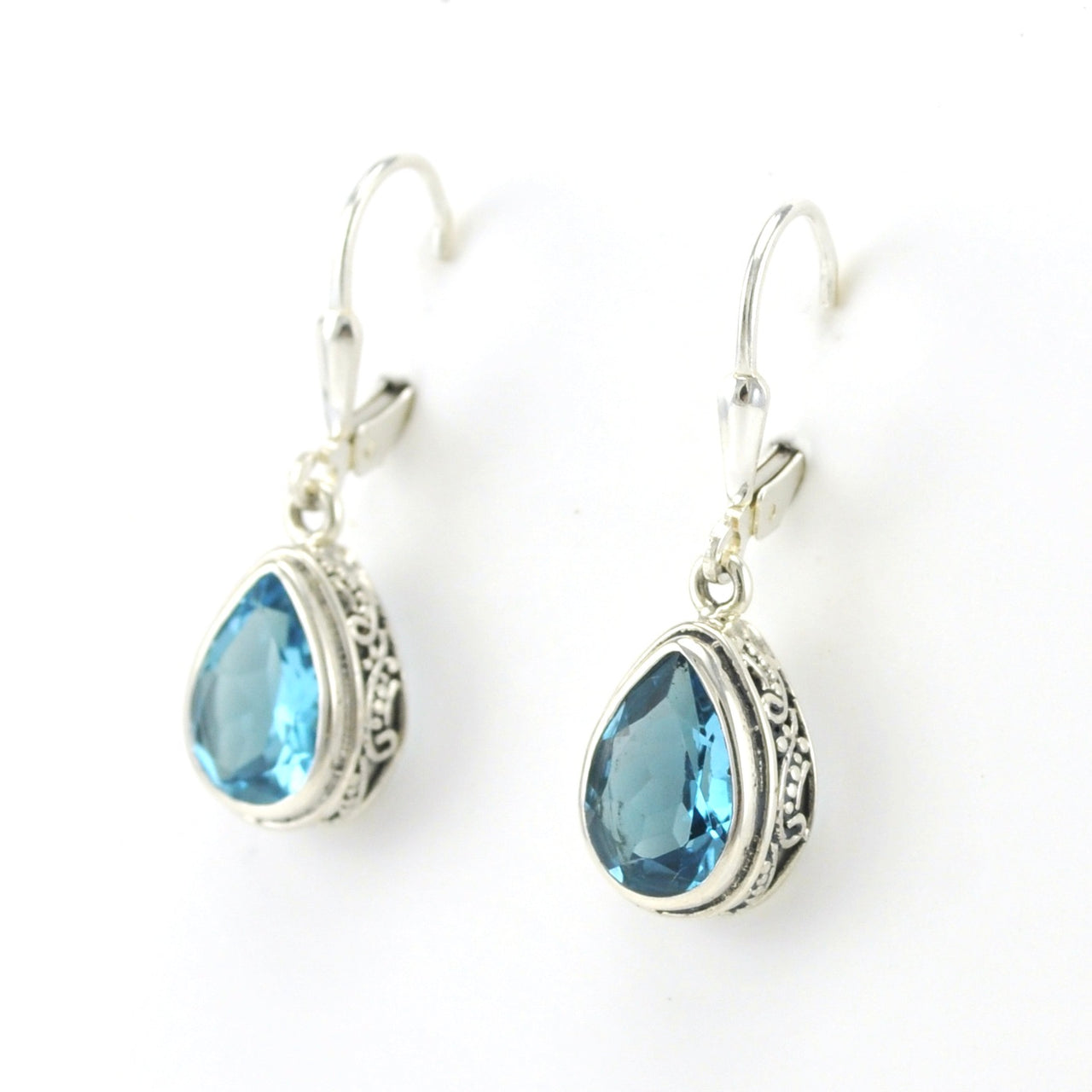 Side Veiw Sterling Silver Blue Topaz 7x10mm Tear Bali Dangle Earrings