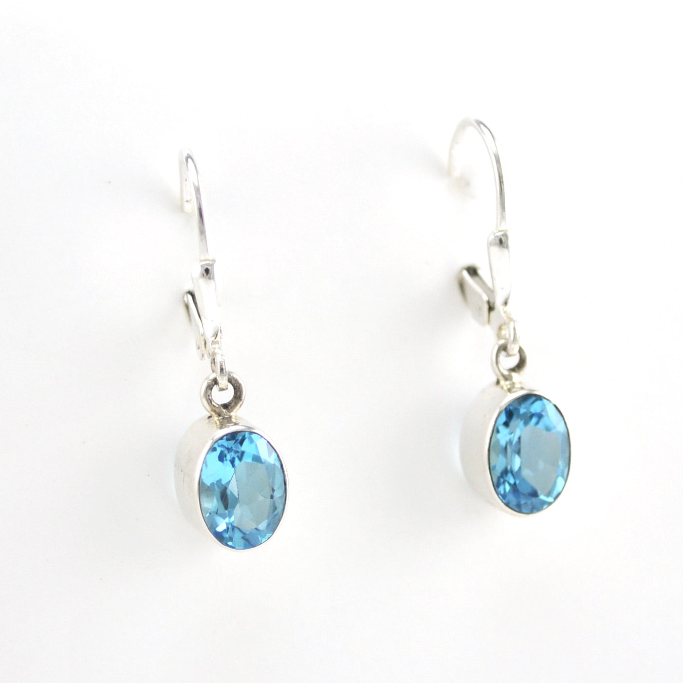 Alternate View Silver Blue Topaz 6x8mm Oval Dangle Earrings