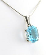 Side View Sterling Silver Blue Topaz 12x16mm Oval Pendant