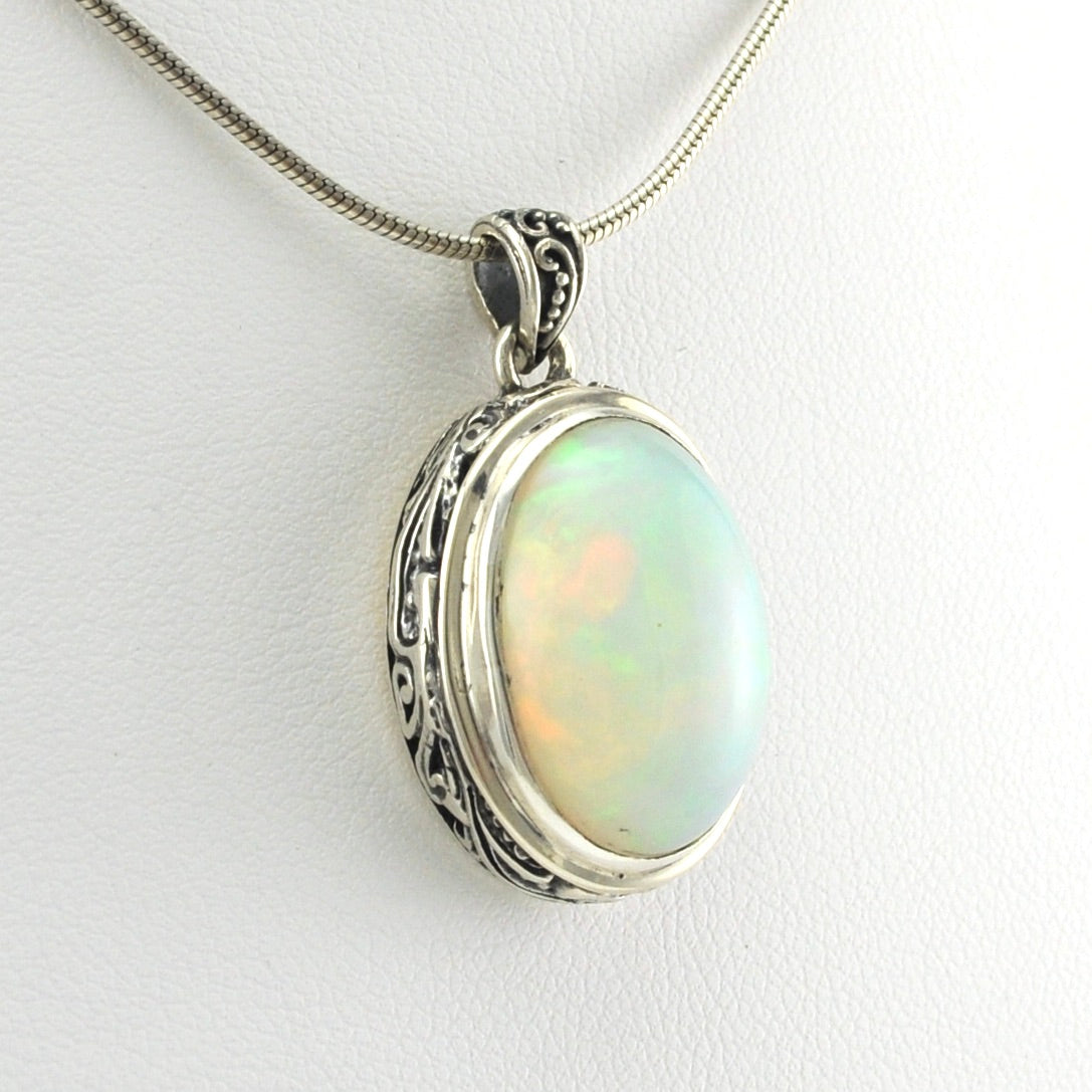 Side View Sterling Silver Ethiopian Opal 13x18mm Oval Bali Pendant