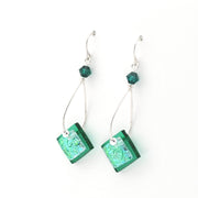 Green square beaded earrings on a white background