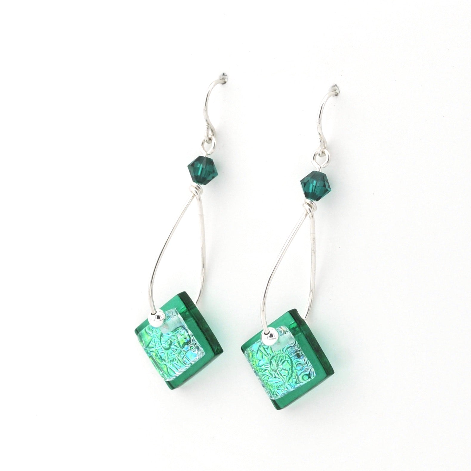 Green square beaded earrings on a white background