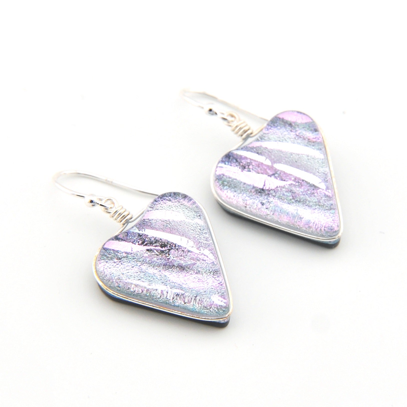 Heart earrings with purple and white striped design on a white background