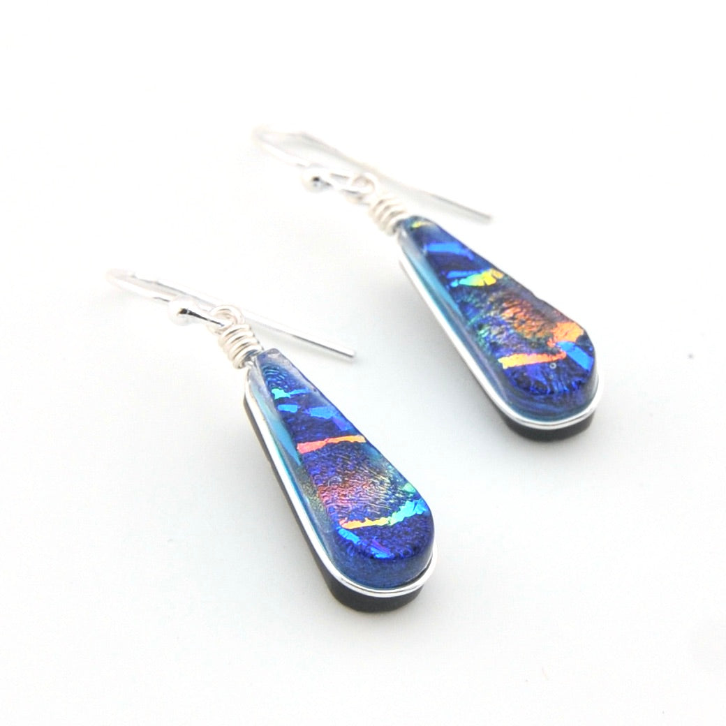 Teardrop-shaped earrings with multicolored inlay on a white background