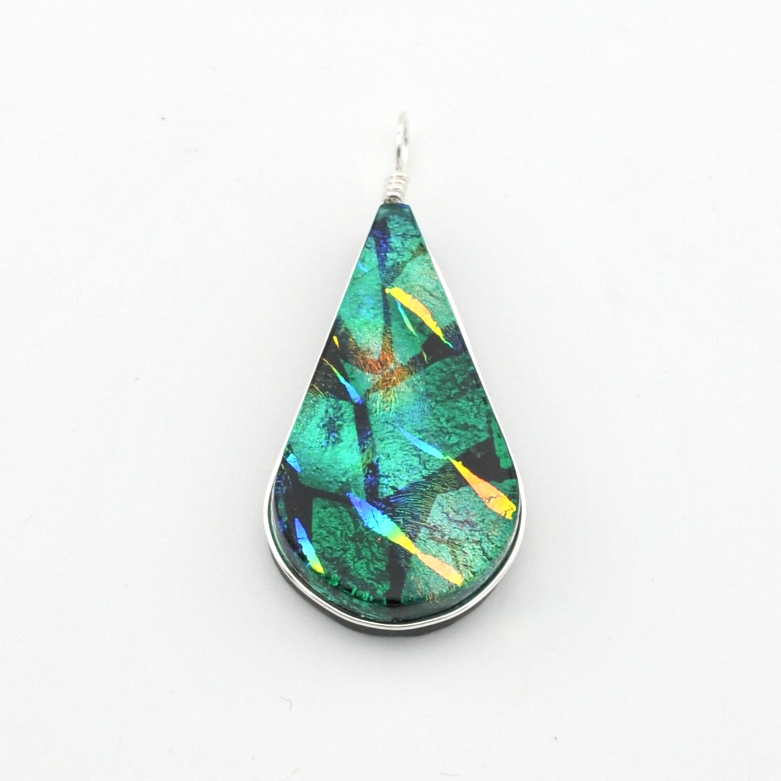 A teardrop-shaped pendant featuring a green iridescent stone with blue, yellow, and orange flashes, set in a silver bezel with a silver wire-wrapped bail, shown on a plain white background.