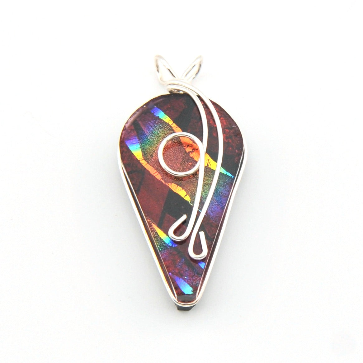 Multicolored teardrop pendant with silver wire design on a white background