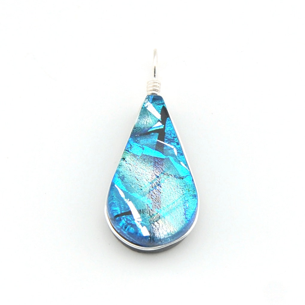Teardrop-shaped blue pendant on a white background