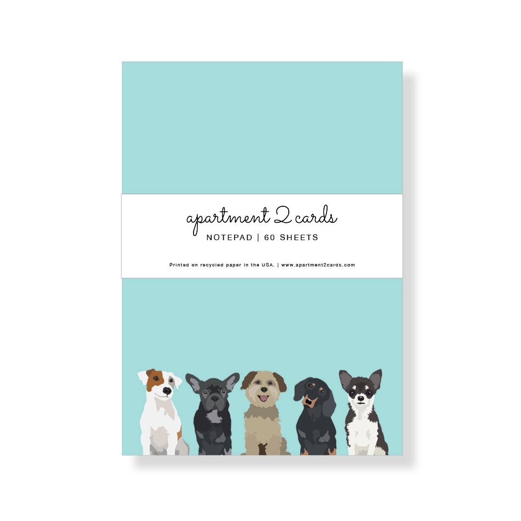 Notepad with illustrations of dogs on a light blue background, featuring the brand 'apartment 2 cards'.