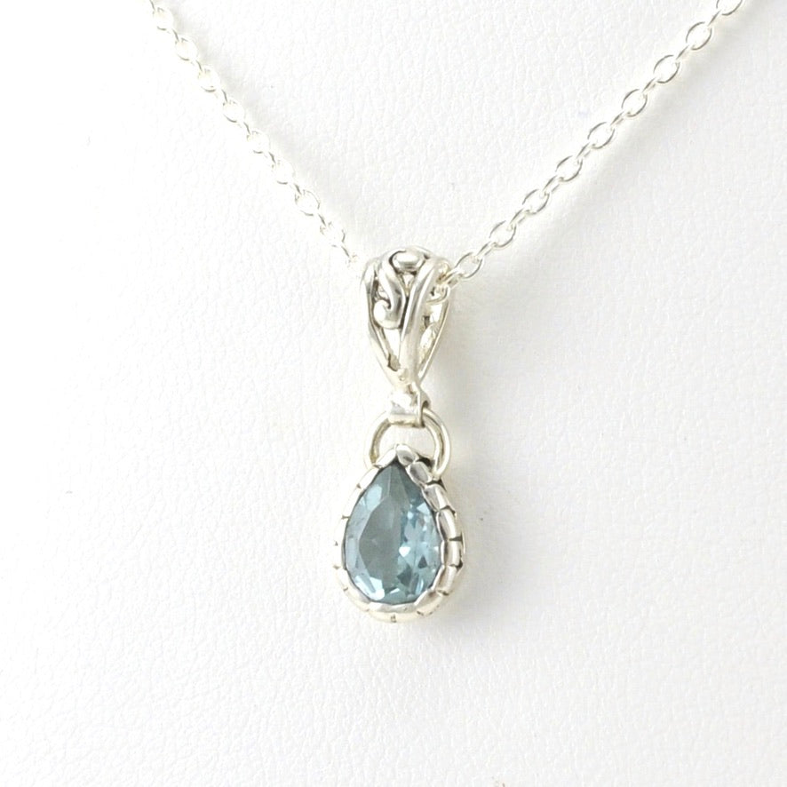 Side View Sterling Silver Blue Topaz Tear Necklace
