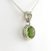 Side View Sterling Silver Peridot 7x9mm Oval Bali Necklace