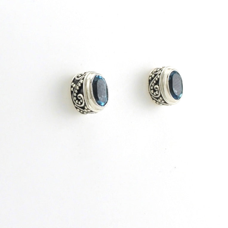 Side View Sterling Silver Blue Topaz 4x6mm Oval Bali Post Earrings