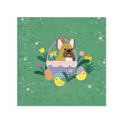 Illustration of a dog in an Easter basket with flowers and chicks on a green background