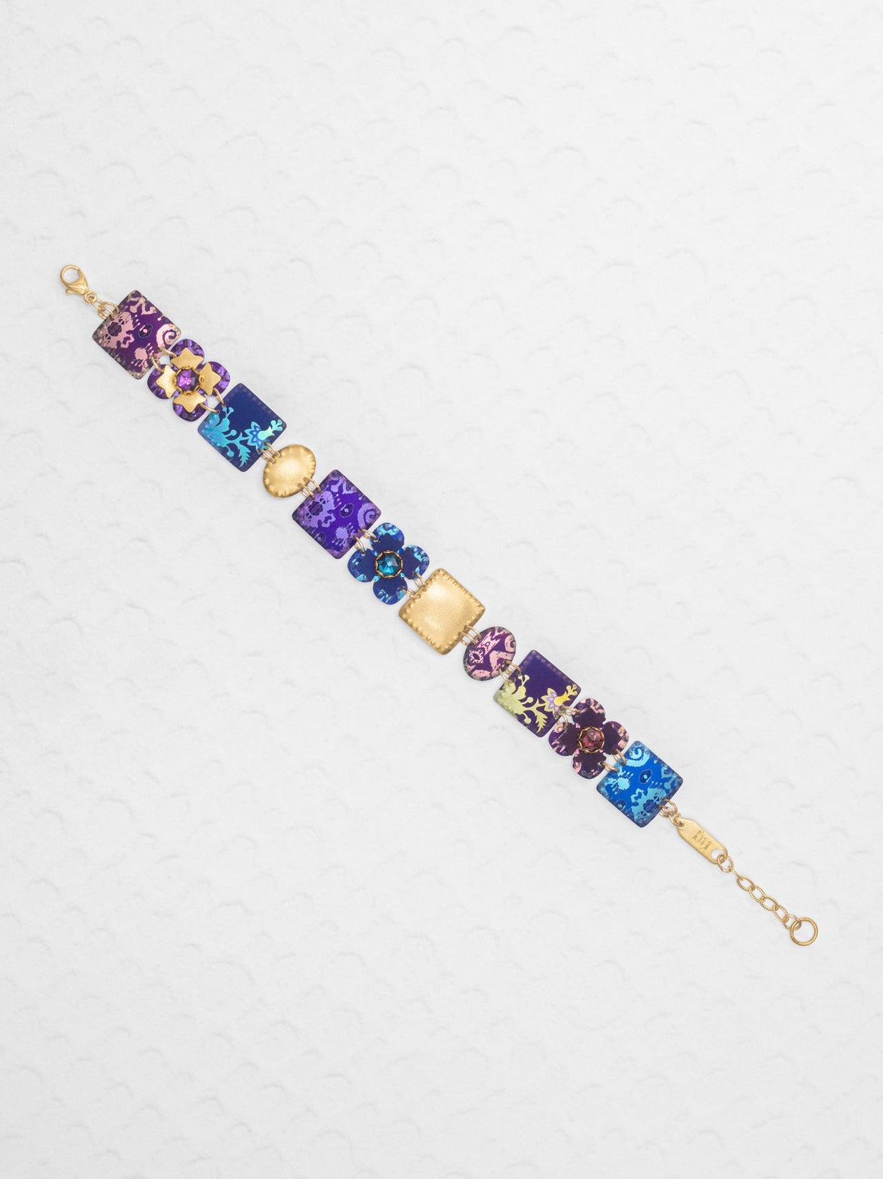 Multicolored gemstone bracelet on a white background