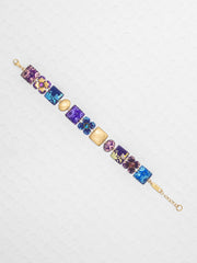 Multicolored gemstone bracelet on a white background