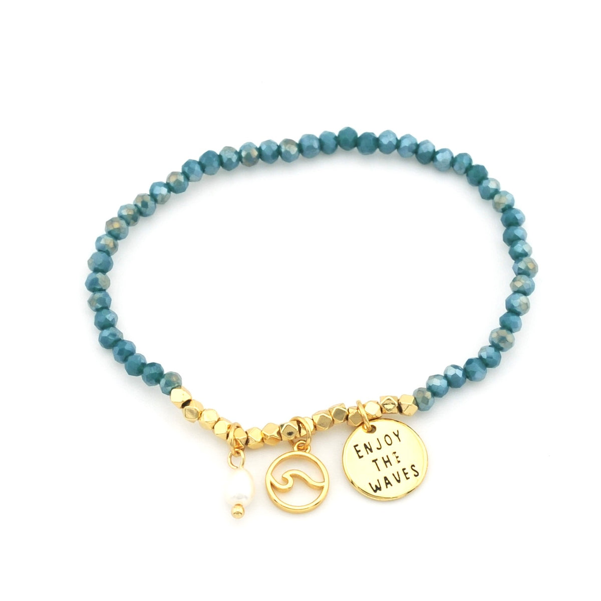 Crystal stretch bracelet with gold wave charm and charm that say "Enjoy the waves."