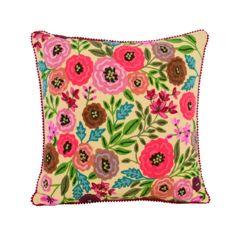 Floral patterned pillow on a white background