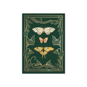 Decorative card with butterflies and floral patterns on a green background