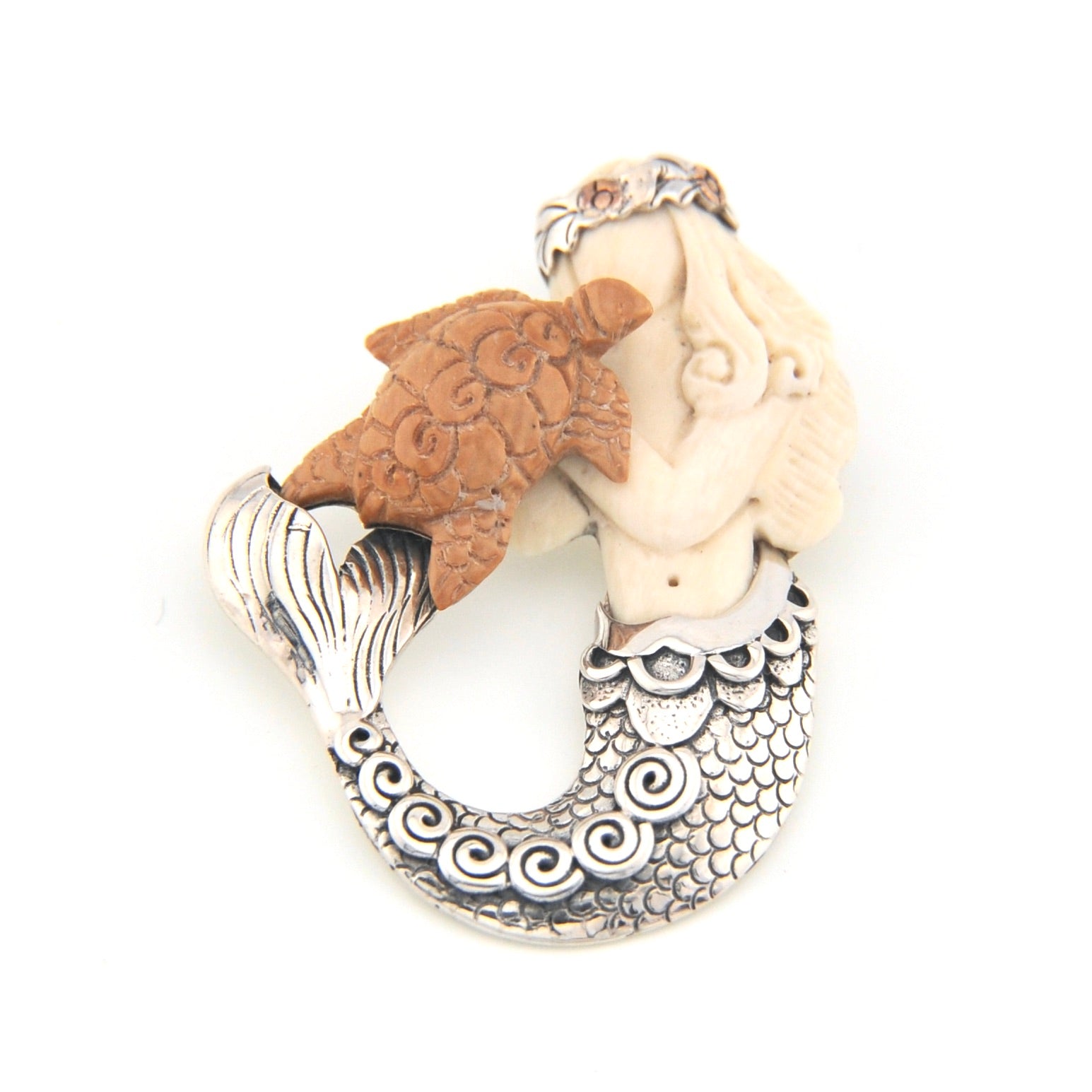 Pendant with mermaid and sea turtle design on a white background