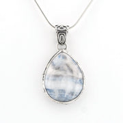 A silver teardrop pendant necklace featuring a marbled blue and white stone, suspended from a delicate silver chain against a plain white background.