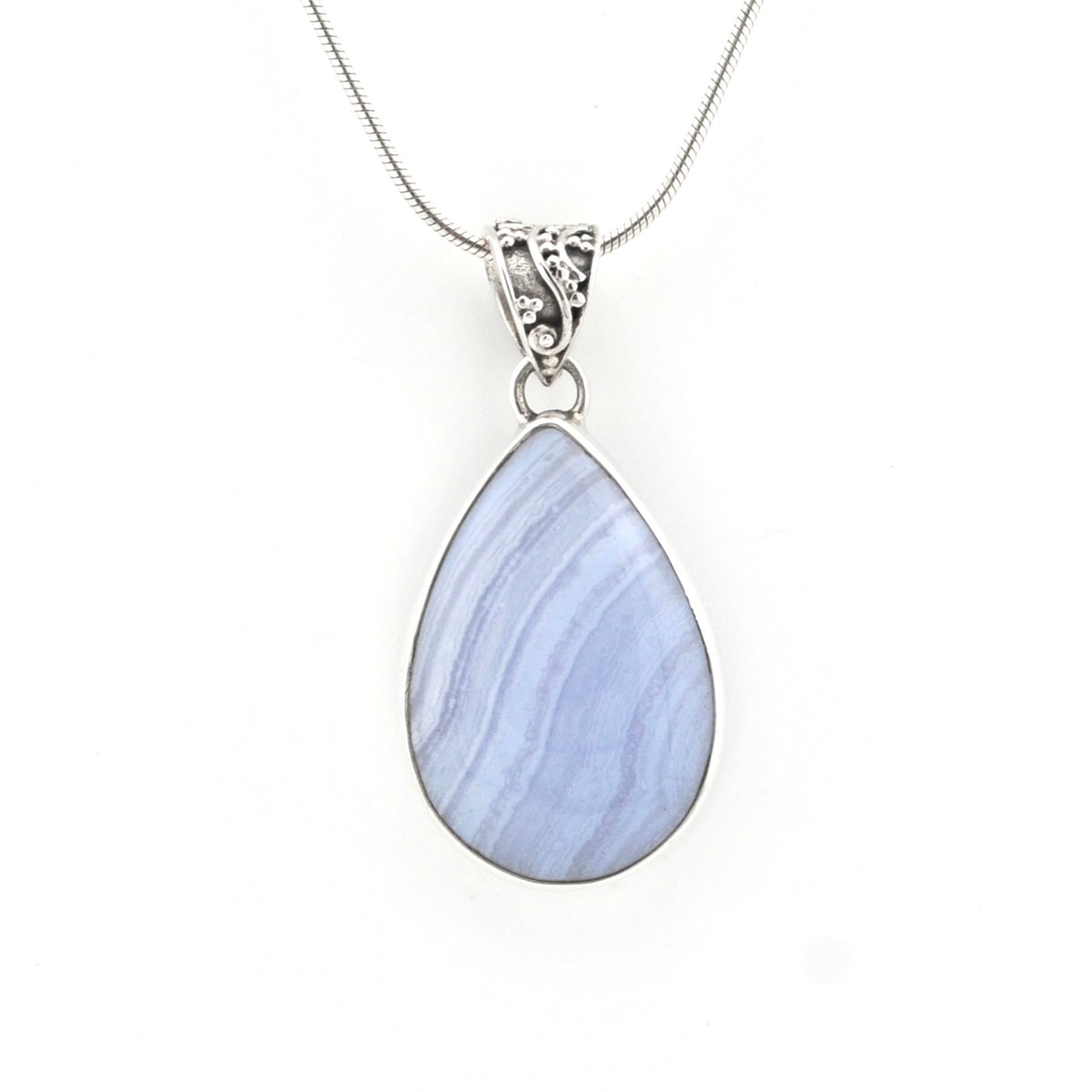 A silver teardrop pendant necklace featuring a light blue and lavender marbled stone, suspended from a delicate silver chain against a plain white background.