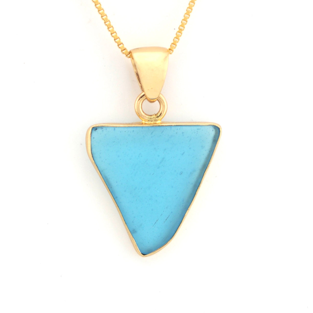 Gold necklace with a blue triangular pendant on a white background