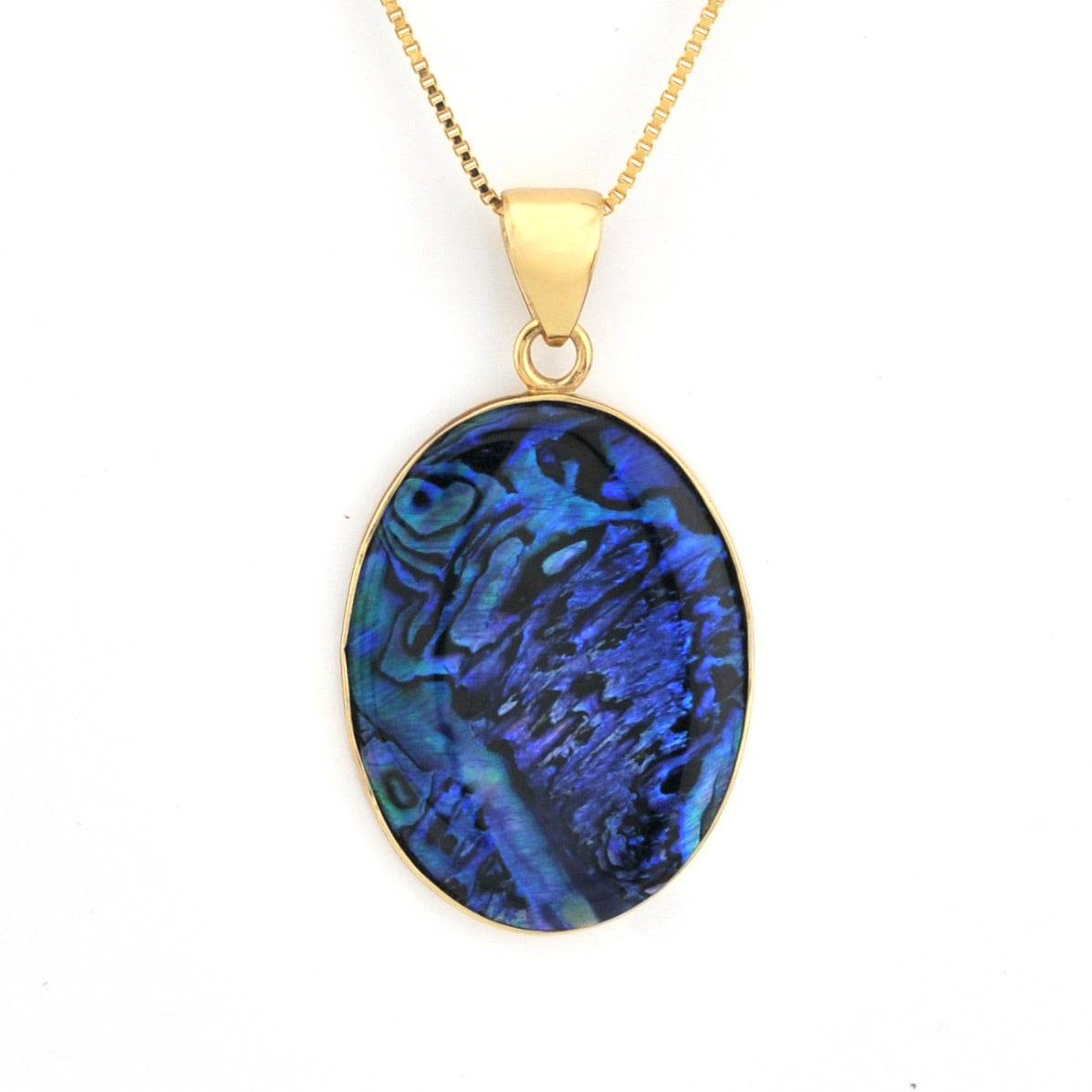Gold necklace with a blue oval pendant on a white background
