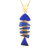 Blue geometric pendant necklace on a white background