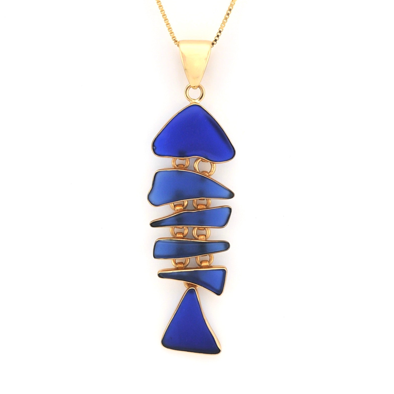 Blue geometric pendant necklace on a white background