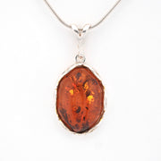 Front View Amber Oval Filigree Bezel Pendant