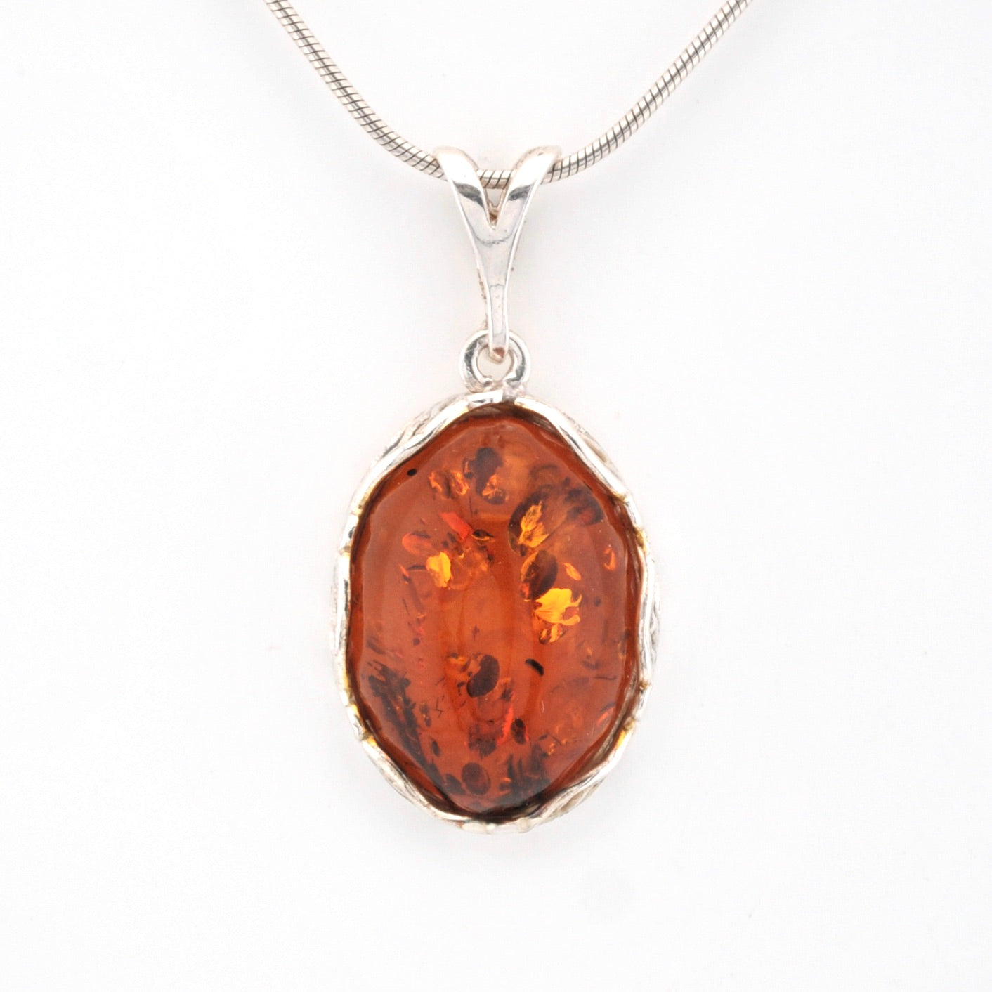 Front View Amber Oval Filigree Bezel Pendant
