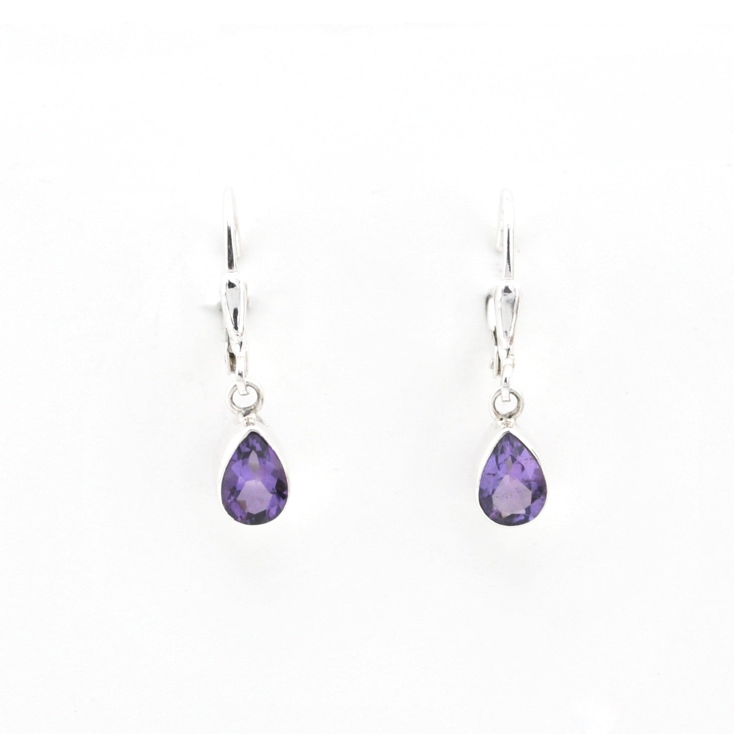 Pair of purple teardrop earrings on a white background