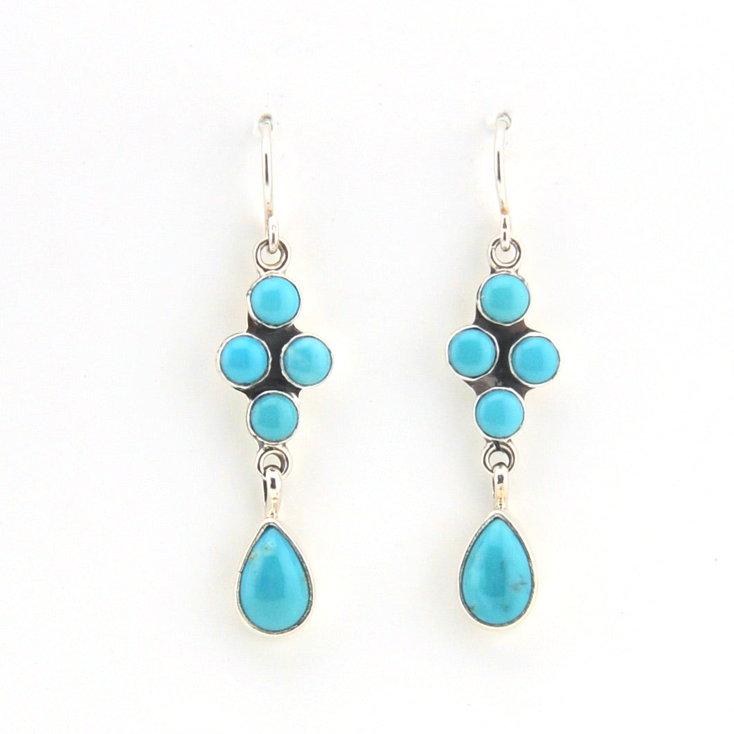 Turquoise stone earrings on a white background