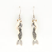 Mermaid earrings on a white background