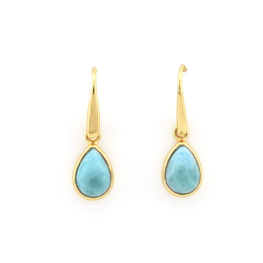 A pair of gold drop earrings with teardrop-shaped light blue larimar stones, shown against a plain white background.