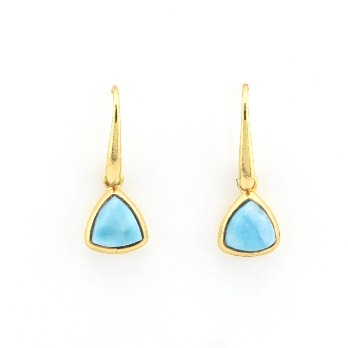 A pair of gold drop earrings with triangular light blue gemstones, shown on a plain white background.