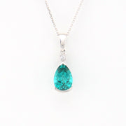 Teardrop-shaped gemstone pendant on a white background