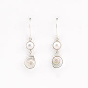 Pair of pearl earrings on a white background