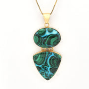 Necklace with green marbled pendant on a white background