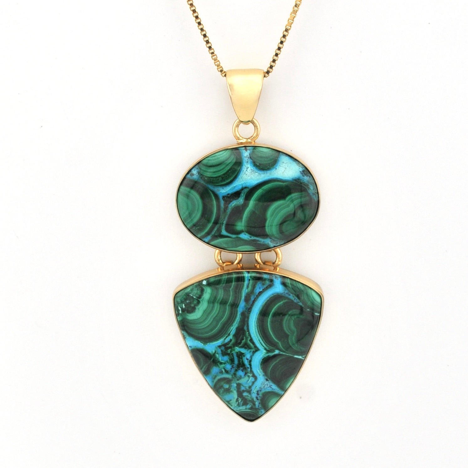 Necklace with green marbled pendant on a white background