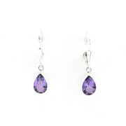 Pair of teardrop-shaped purple earrings on a white background