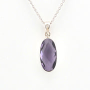 Necklace with a purple pendant on a white background