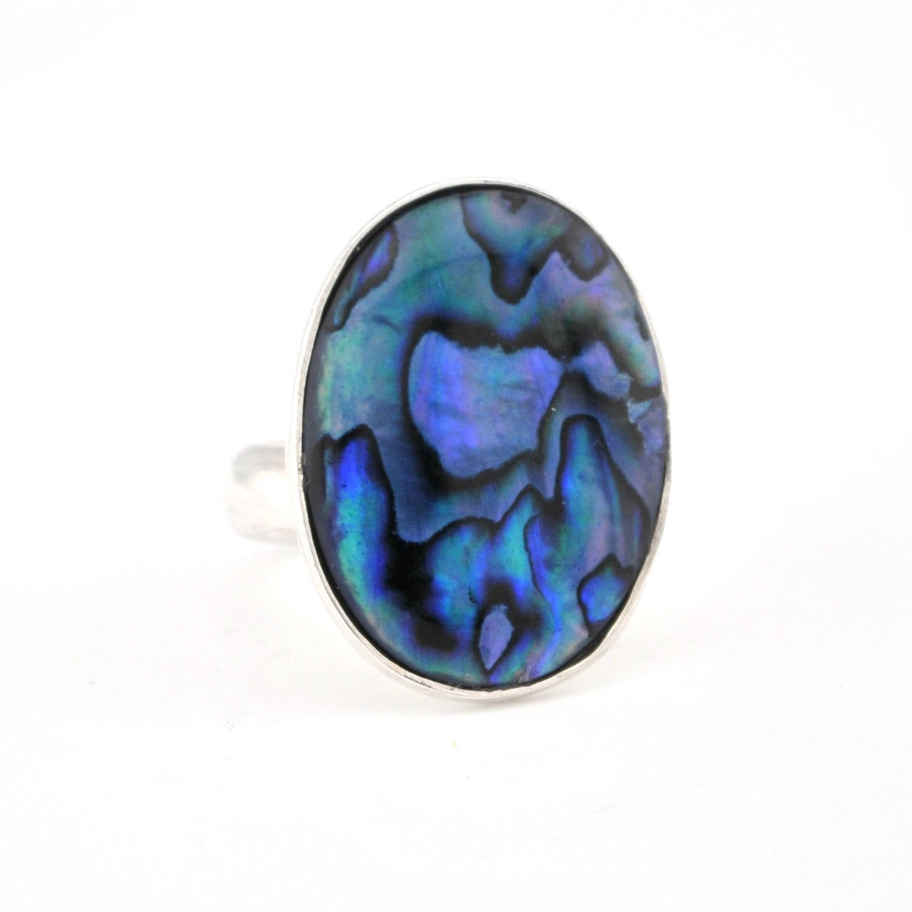 Ring with a colorful abalone shell stone on a white background
